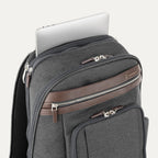 Vintage Gray backpack with laptop visibly stored in the dedicated sleeve compartment.
