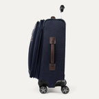 Side view of expanded true navy suitcase with black wheels and handle on a white background