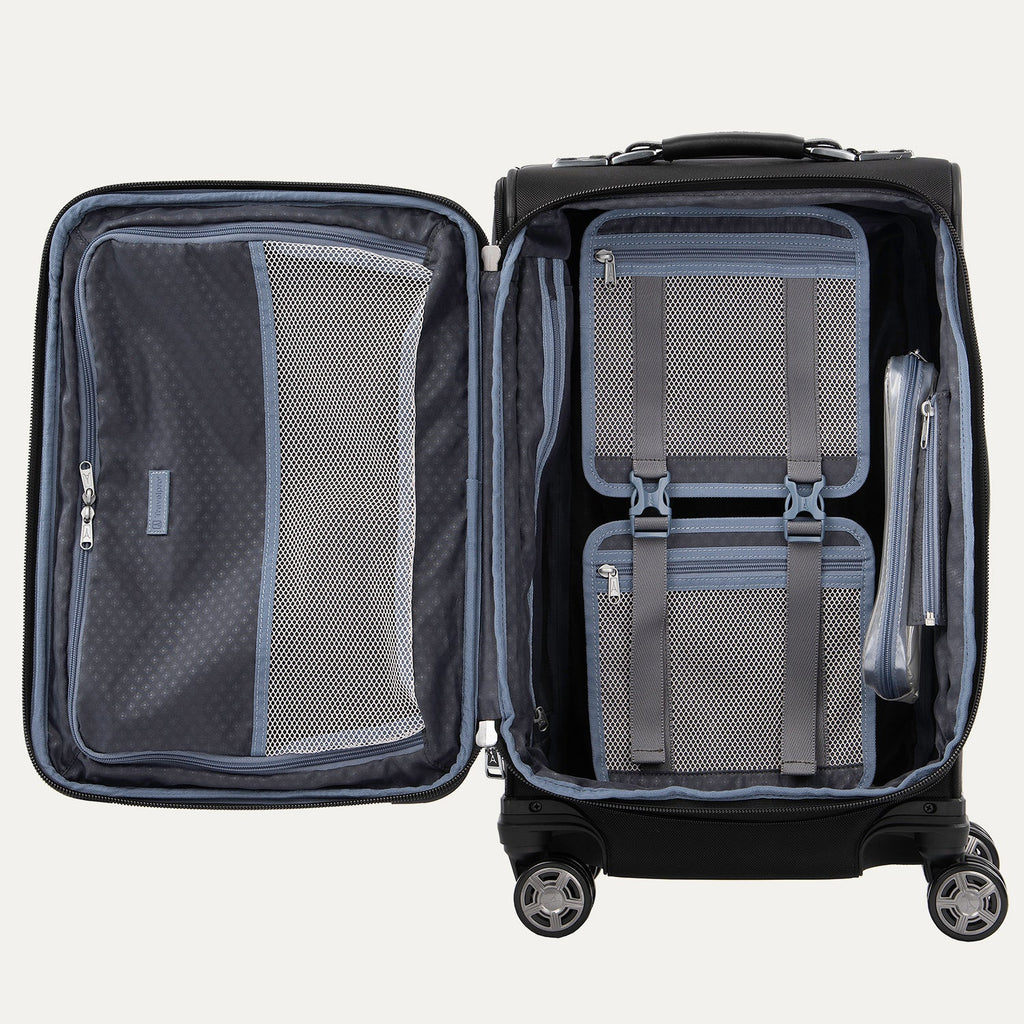 Open suitcase displaying interior organization panels on a white background
