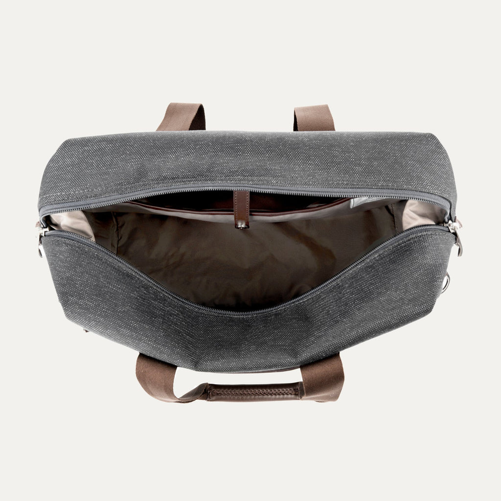 Open vintage grey tote on a white background