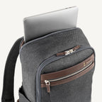 Vintage Gray backpack with laptop visibly stored in the dedicated sleeve compartment.
