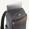 Vintage Gray backpack with laptop visibly stored in the dedicated sleeve compartment.
