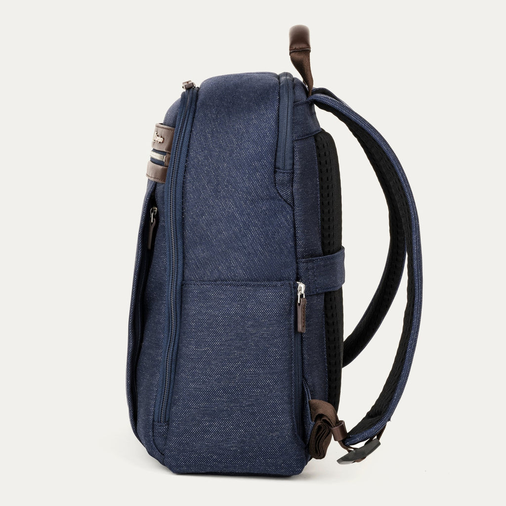Side view of true navy backpack on a white background 
