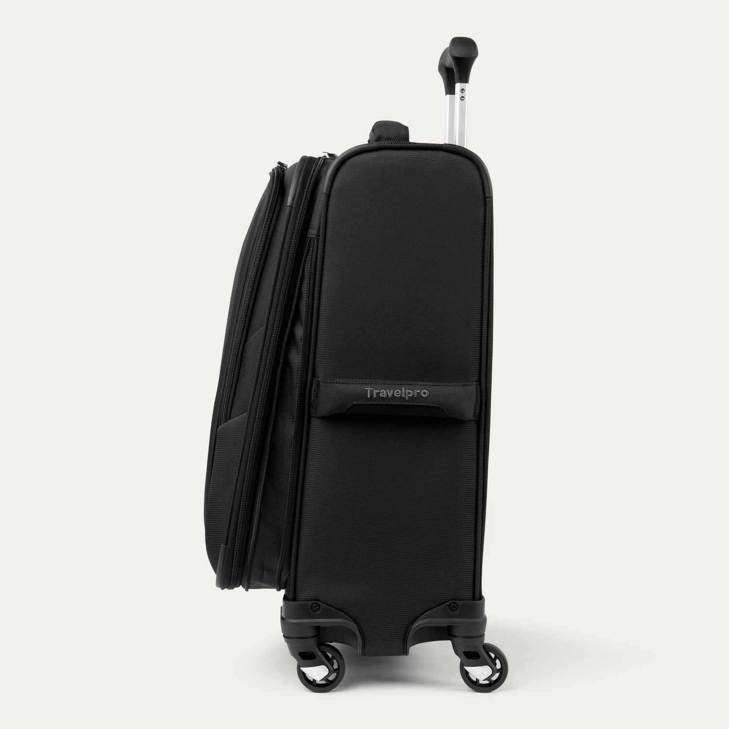 Side view of black suitcase with Travelpro logo on a white background