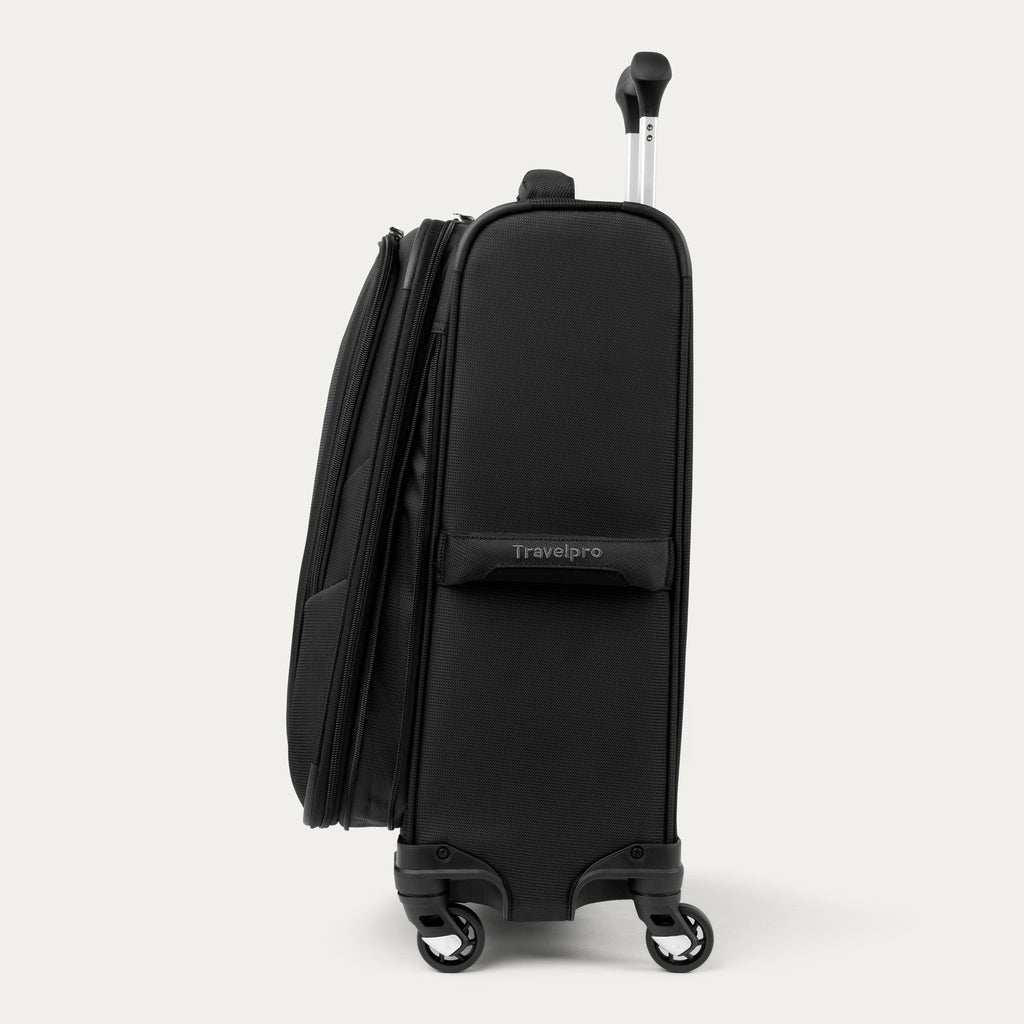 Side view of black suitcase with Travelpro logo on a white background
