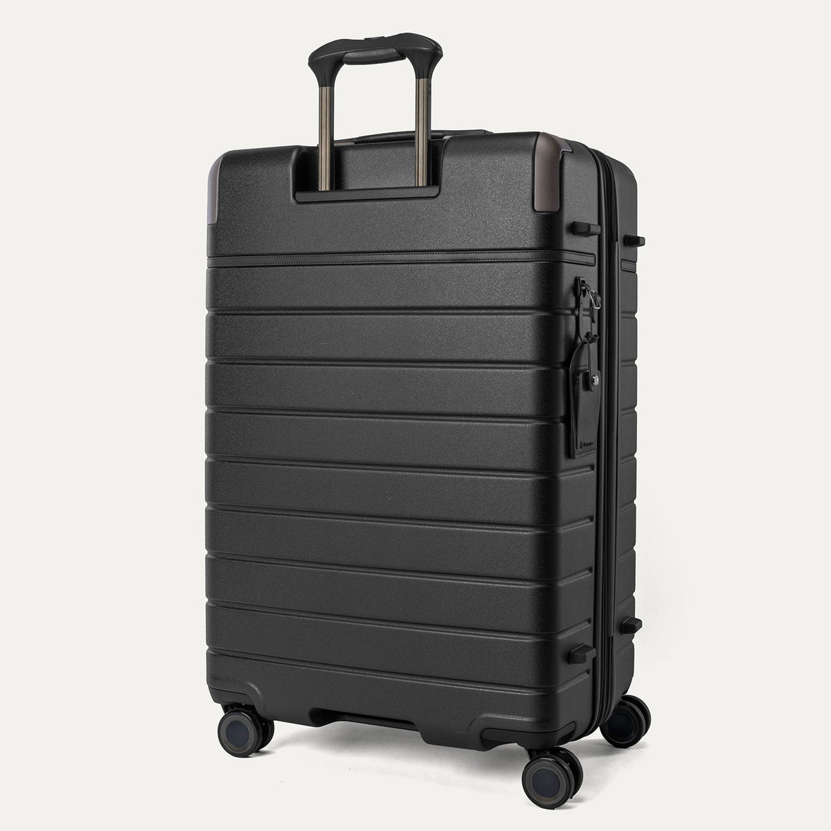 Rear angled view of the Large Check-In from the Travelpro Platinum Reserve Compact Carry-On / Large Check-In Hardside Set in Black Dust
