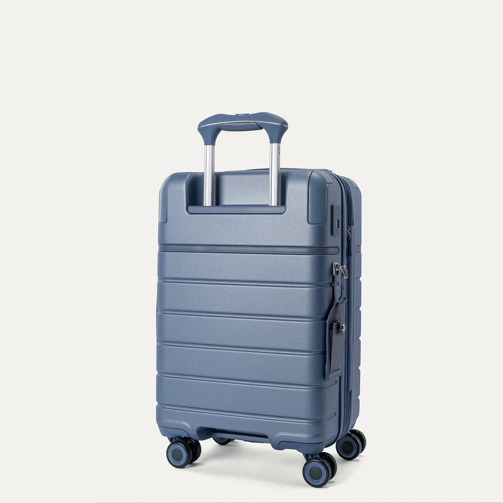 Rear angled view of the Compact Carry-On from the Travelpro Platinum Reserve Compact Carry-On / Medium Check-In Hardside Set in Steel Blue