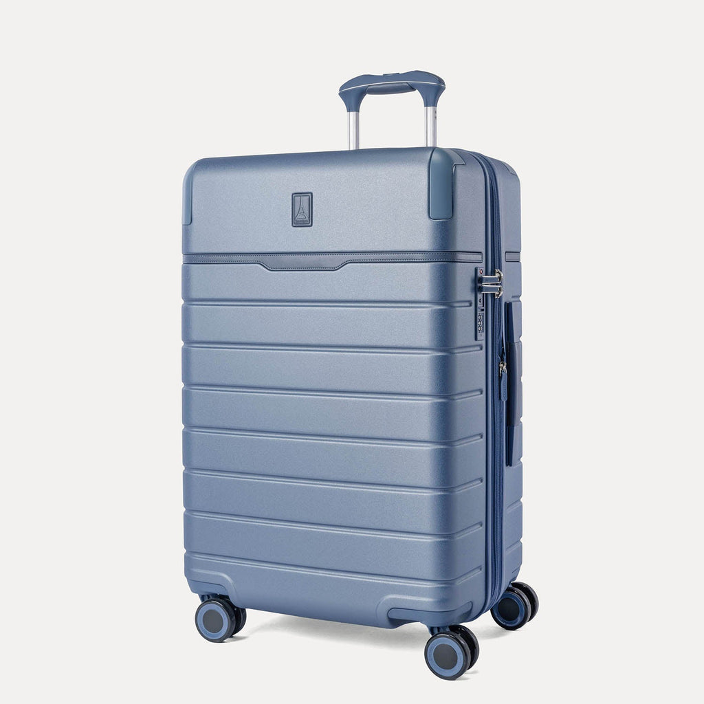 Three-quarter front view of the Medium Check-In from the Travelpro Platinum Reserve Compact Carry-On / Medium Check-In Hardside Set in Steel Blue