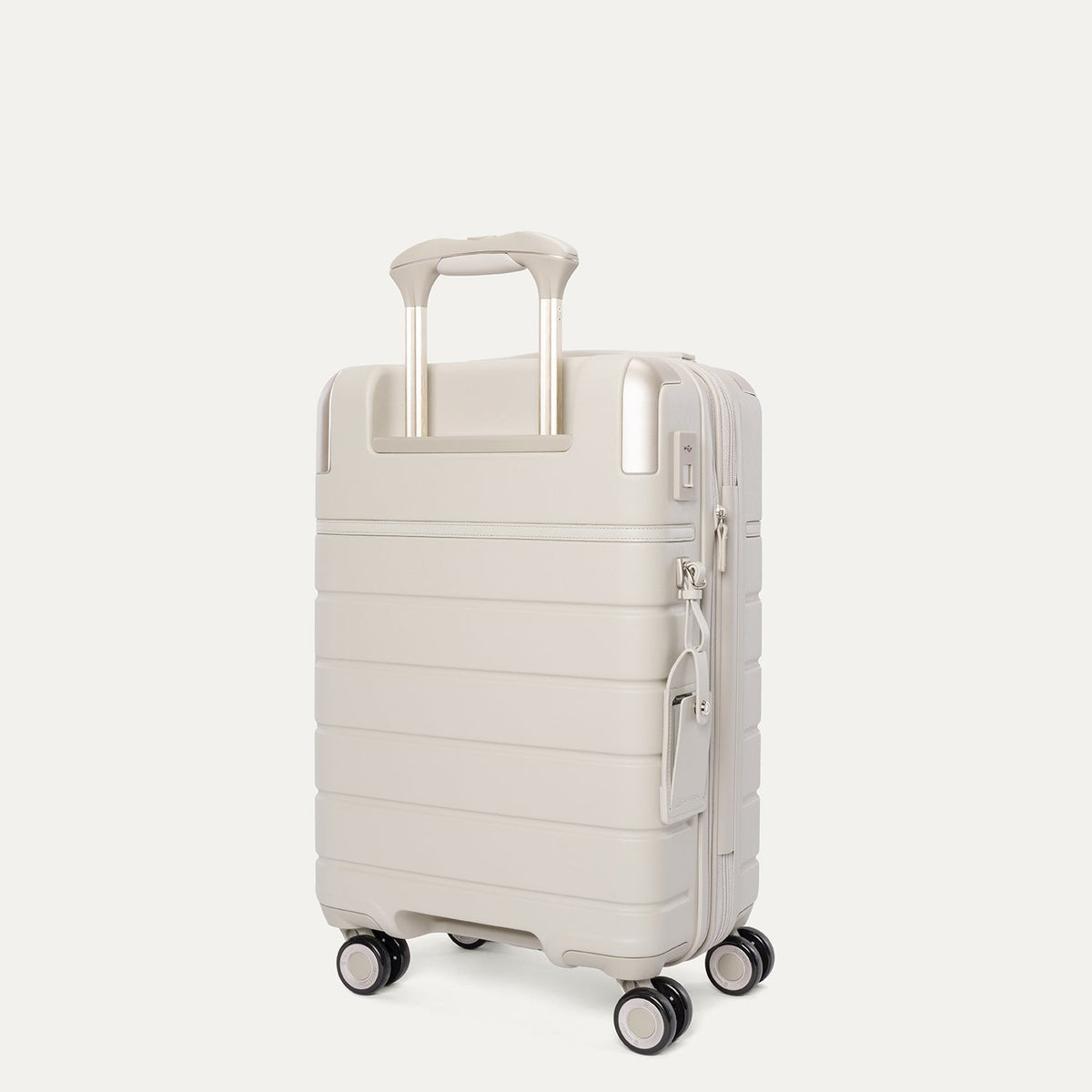 Rear angled view of the Compact Carry-On from the Travelpro Platinum Reserve Compact Carry-On / Medium Check-In Hardside Set in Sandstone