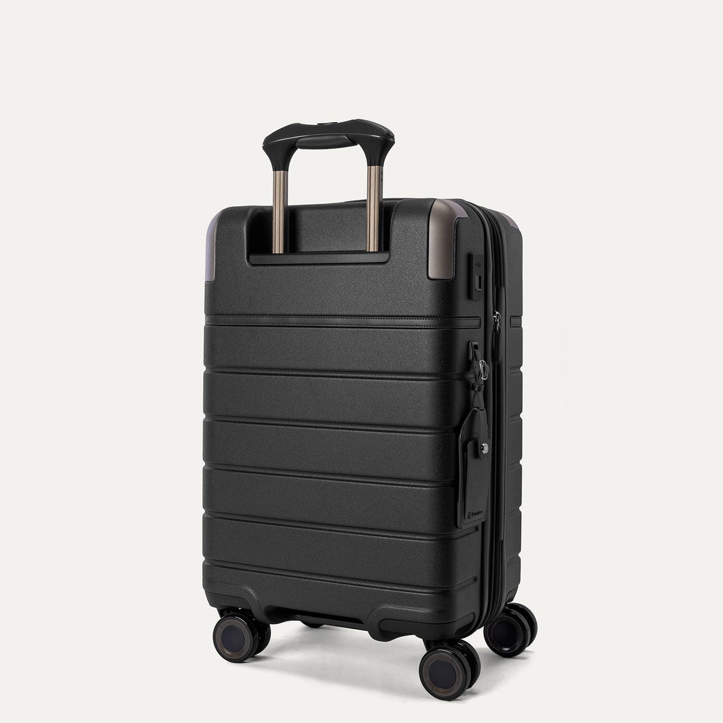 Rear angled view of the Compact Carry-On from the Travelpro Platinum Reserve Compact Carry-On / Medium / Large Hardside Set in Black Dust