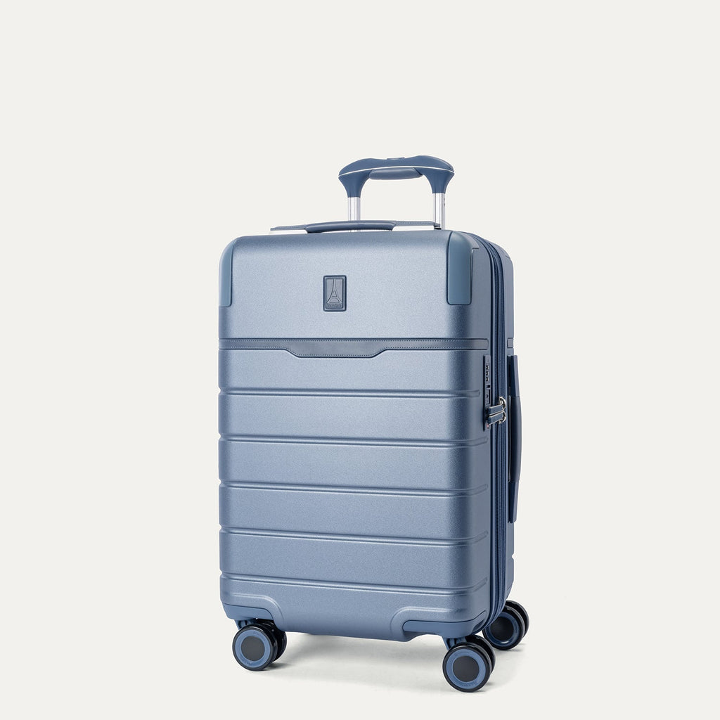 Three-quarter front view of the Compact Carry-On from the Travelpro Platinum Reserve Compact Carry-On / Medium / Large Hardside Set in Steel Blue
