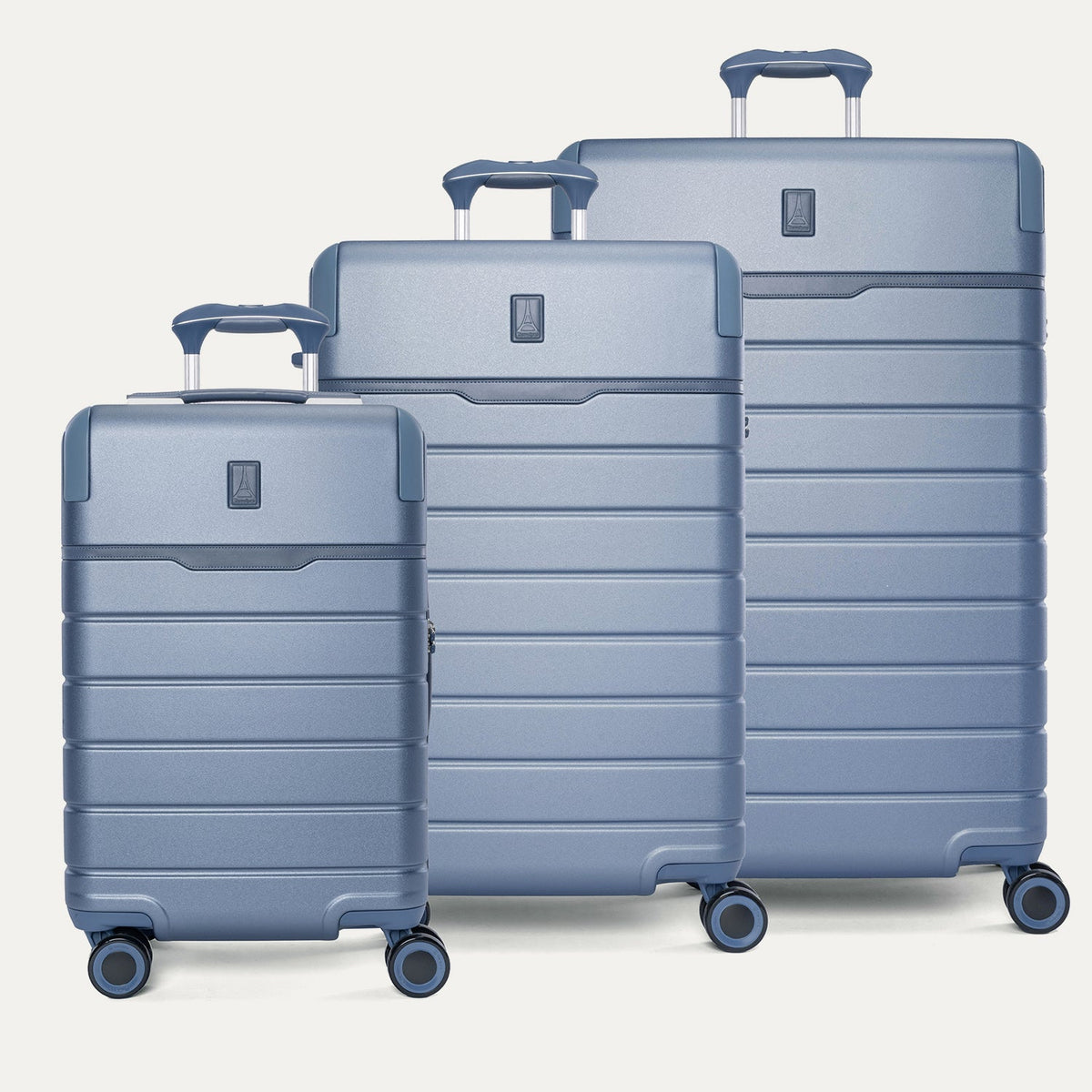 Travelpro Platinum Reserve Compact Carry-On / Medium / Large Hardside Set in Steel Blue, all three pieces shown together
