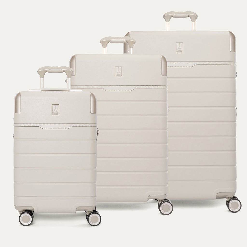 Travelpro Platinum Reserve Compact Carry-On / Medium / Large Hardside Set in Sandstone, all three pieces shown together