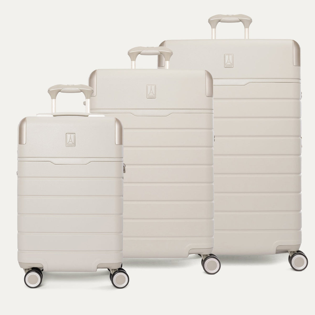 Travelpro Platinum Reserve Compact Carry-On / Medium / Large Hardside Set in Sandstone, all three pieces shown together