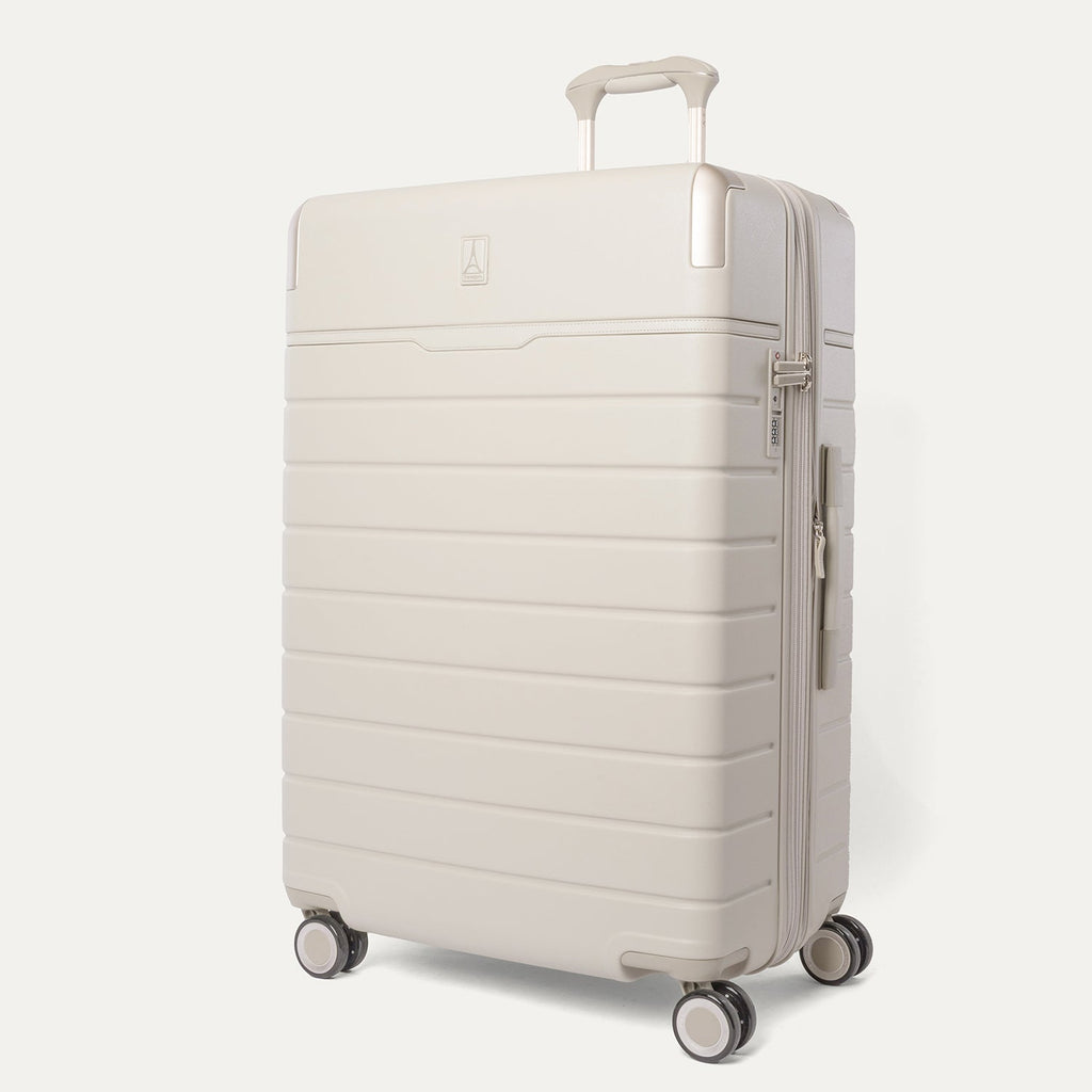 Three-quarter front view of the Large Check-In from the Travelpro Platinum Reserve Compact Carry-On / Medium / Large Hardside Set in Sandstone