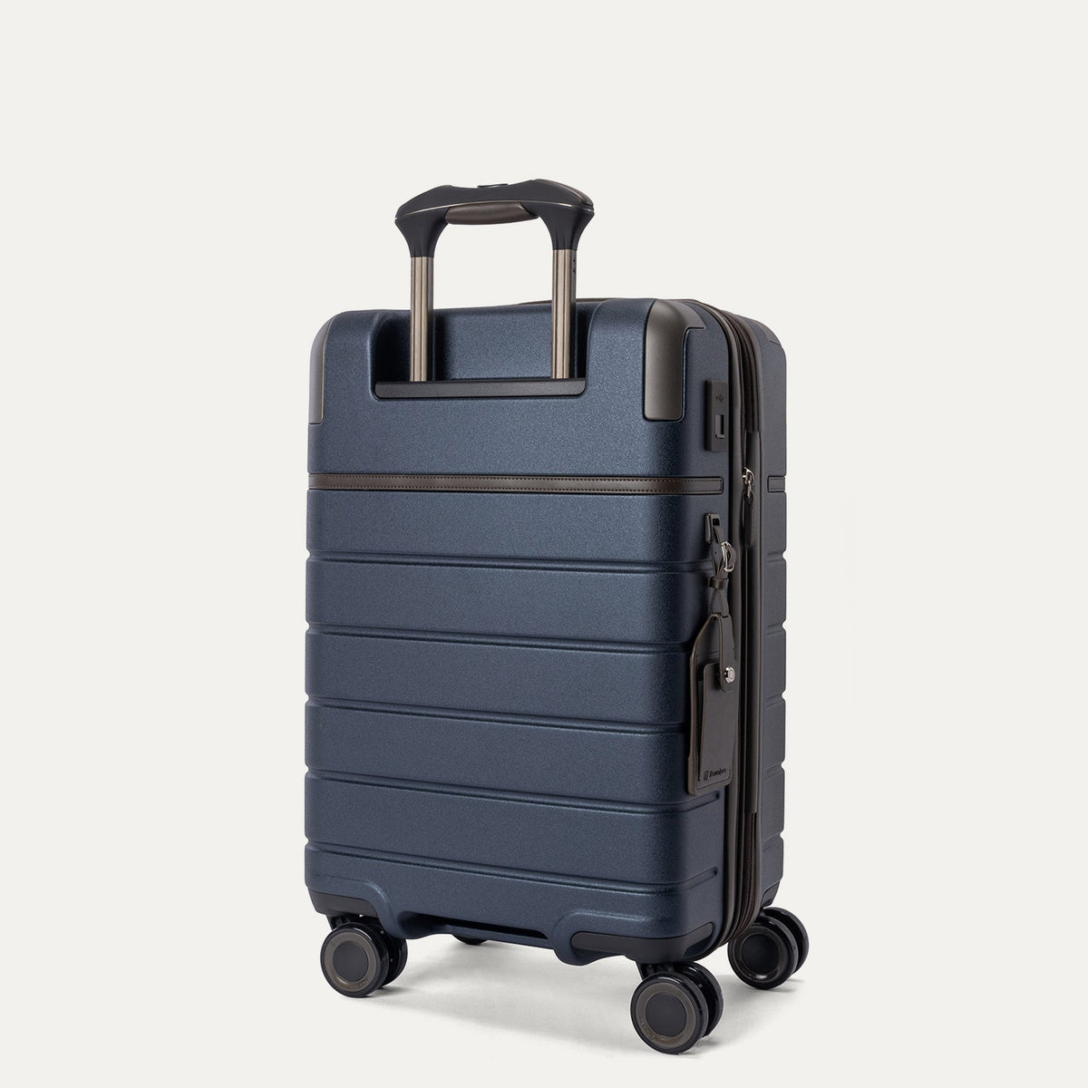 Rear angled view of the Compact Carry-On from the Travelpro Platinum Reserve Compact Carry-On / Medium / Large Hardside Set in Midnight Trail