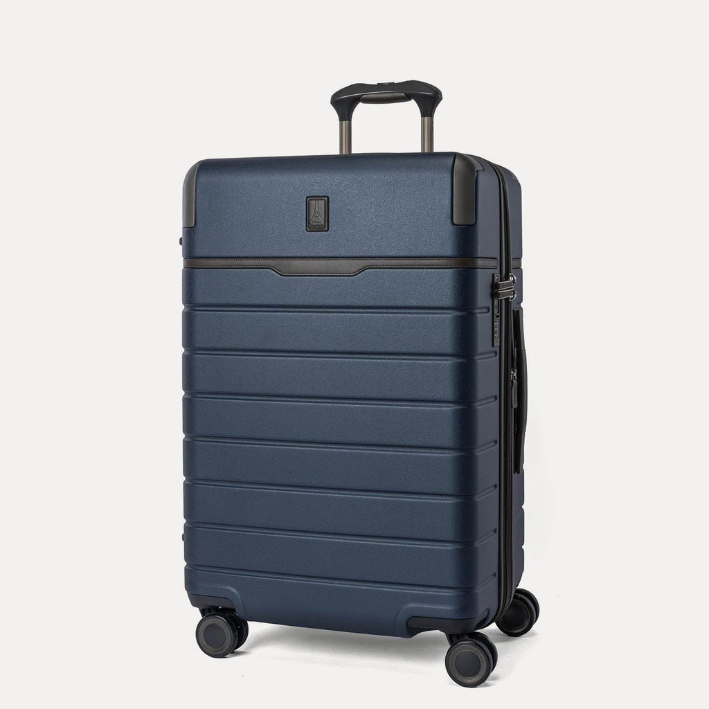 Three-quarter front view of the Medium Check-In from the Travelpro Platinum Reserve Compact Carry-On / Medium / Large Hardside Set in Midnight Trail