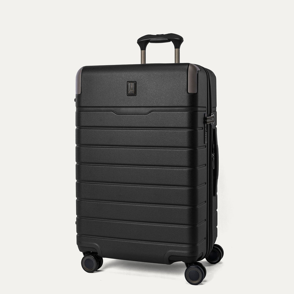 Three-quarter front view of the Medium Check-In from the Travelpro Platinum Reserve Medium / Large Check-In Hardside Set in Black Dust