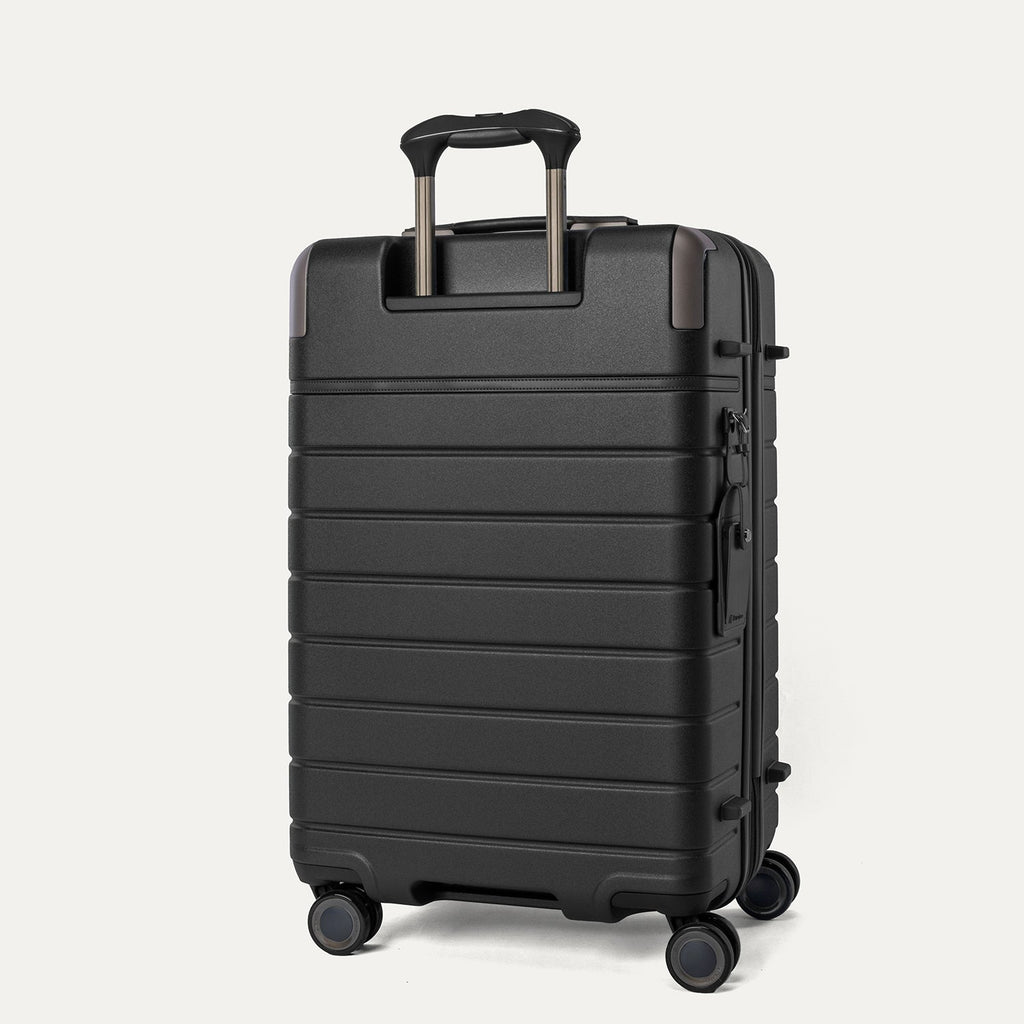 Rear angled view of the Medium Check-In from the Travelpro Platinum Reserve Medium / Large Check-In Hardside Set in Black Dust