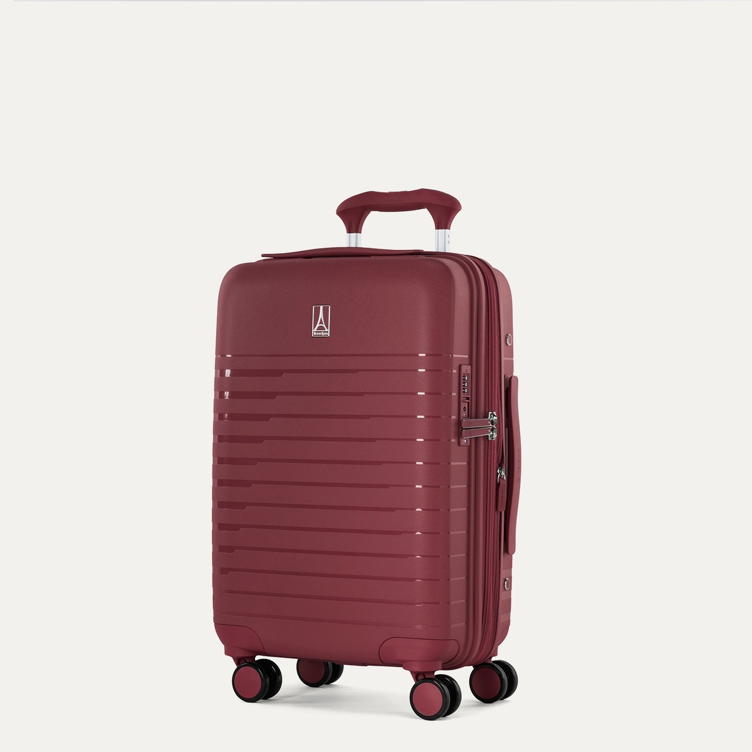 Maroon suitcase with wheels on a light beige background