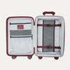 Open red suitcase with interior organization panels on a white background