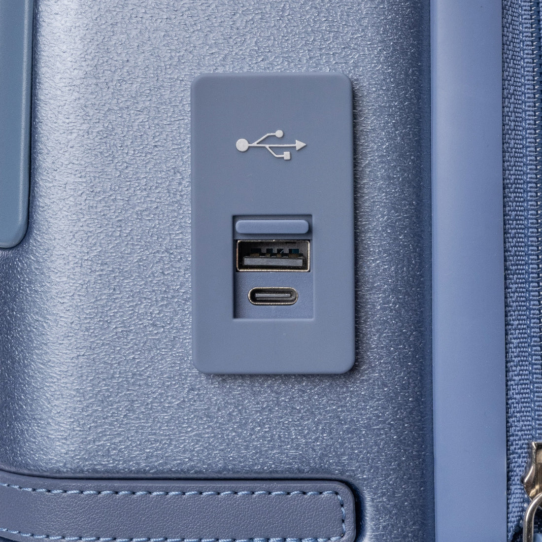 External USB-A and USB-C ports on a Platinum Reserve Compact Carry-On